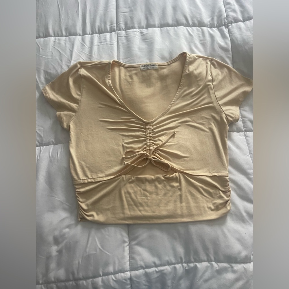 Light yellow crop top v neck with mid cut out section